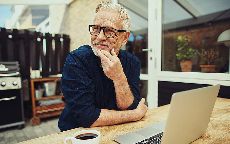 Elderly man researching Cataracts