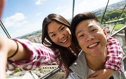 Young couple smiling after Dry Eye Treatment