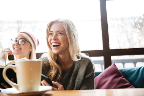 Young woman celebrating after LASIK