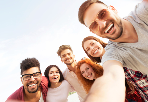 Young people smiling after LASIK