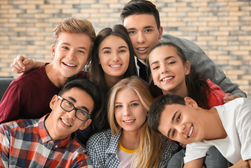 Young people smiling after LASIK