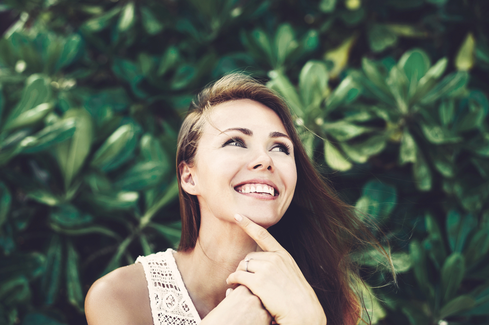 Young woman smiling after LASIK