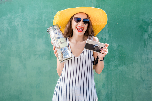 Young woman saving her money for LASIK eye surgery