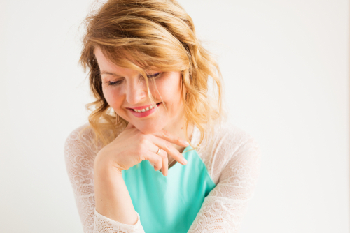 Woman smiling after LASIK