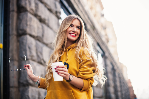 YOung woman smiling after LASIK