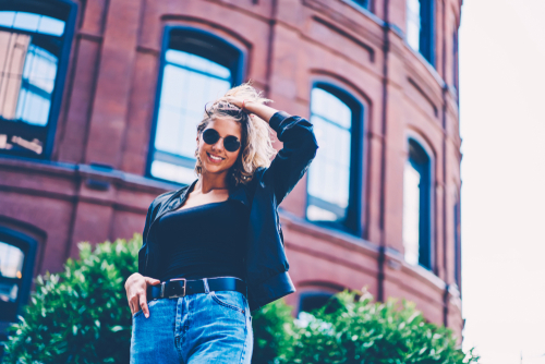 smiling woman in sunglasses