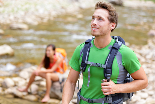 man and woman hiking 