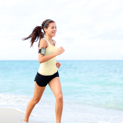 woman running on beach 