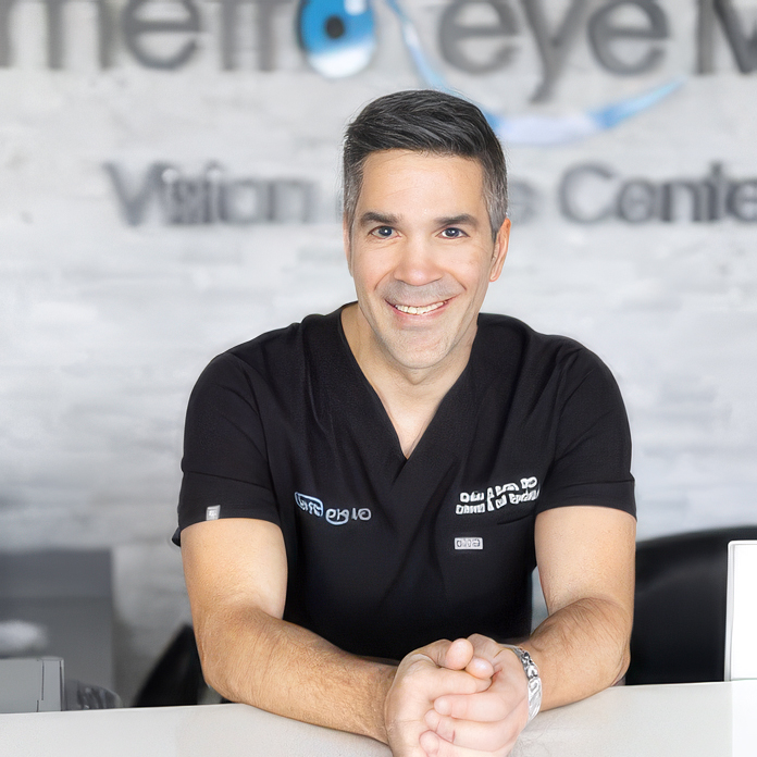 Metro Eye MD doctor smiling at the front desk